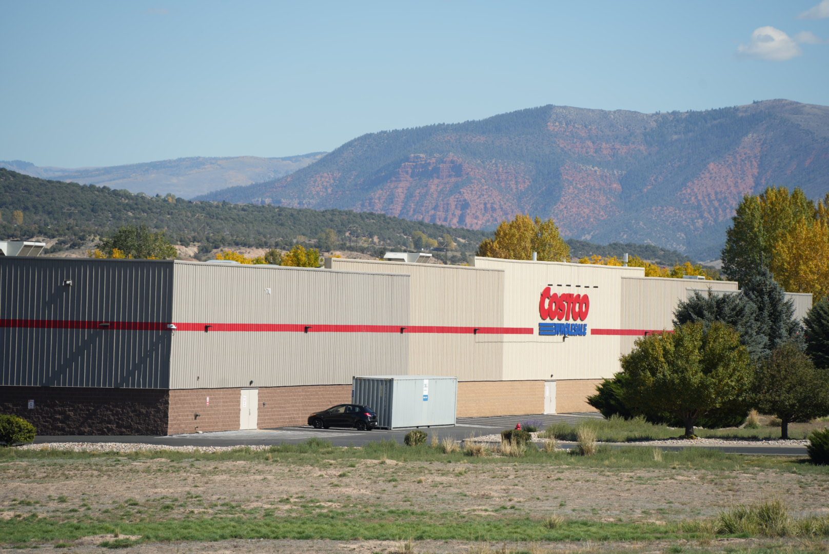 The Costco warehouse in Gypsum under red-rock hills and fall cottonwoods, minutes from the Eagle County airport